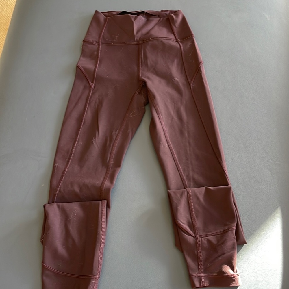 Lululemon full length size 0 burgundy tights